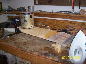 Don't force the bend. It may seem that little is happening at first. But with the minimal weight of a gallon paint can and continually steaming, it will start coming down after 10-15 minutes.