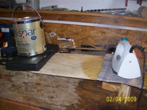 See! It's getting closer. Just keep that Iron steaming the wet rag over the wood. Almost there!