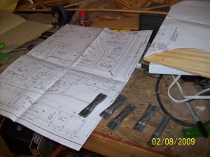 following plans A little bit of time is spent looking over the plans. Here I'm looking over making the control linkage.